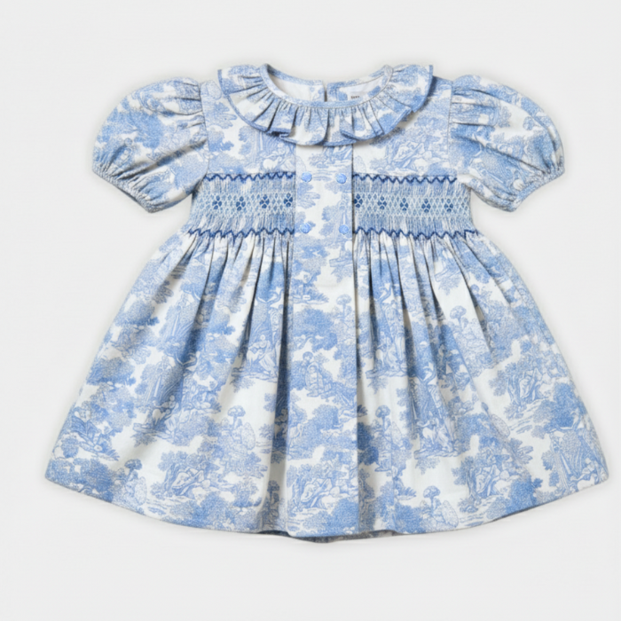 Hand Smocked Toile de Jouy Dress for Girls in Blue | Cotton Candy Lifestyle COTTON CANDY LIFESTYLE Hand Smocked Toile de Jouy Dress for Girls in Blue | Cotton Candy Lifestyle COTTON CANDY LIFESTYLE