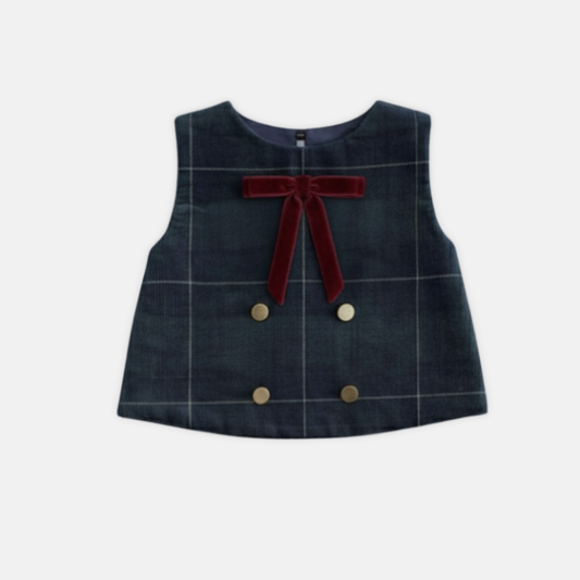 corduroy vest with a red bow and gold buttons on a white background