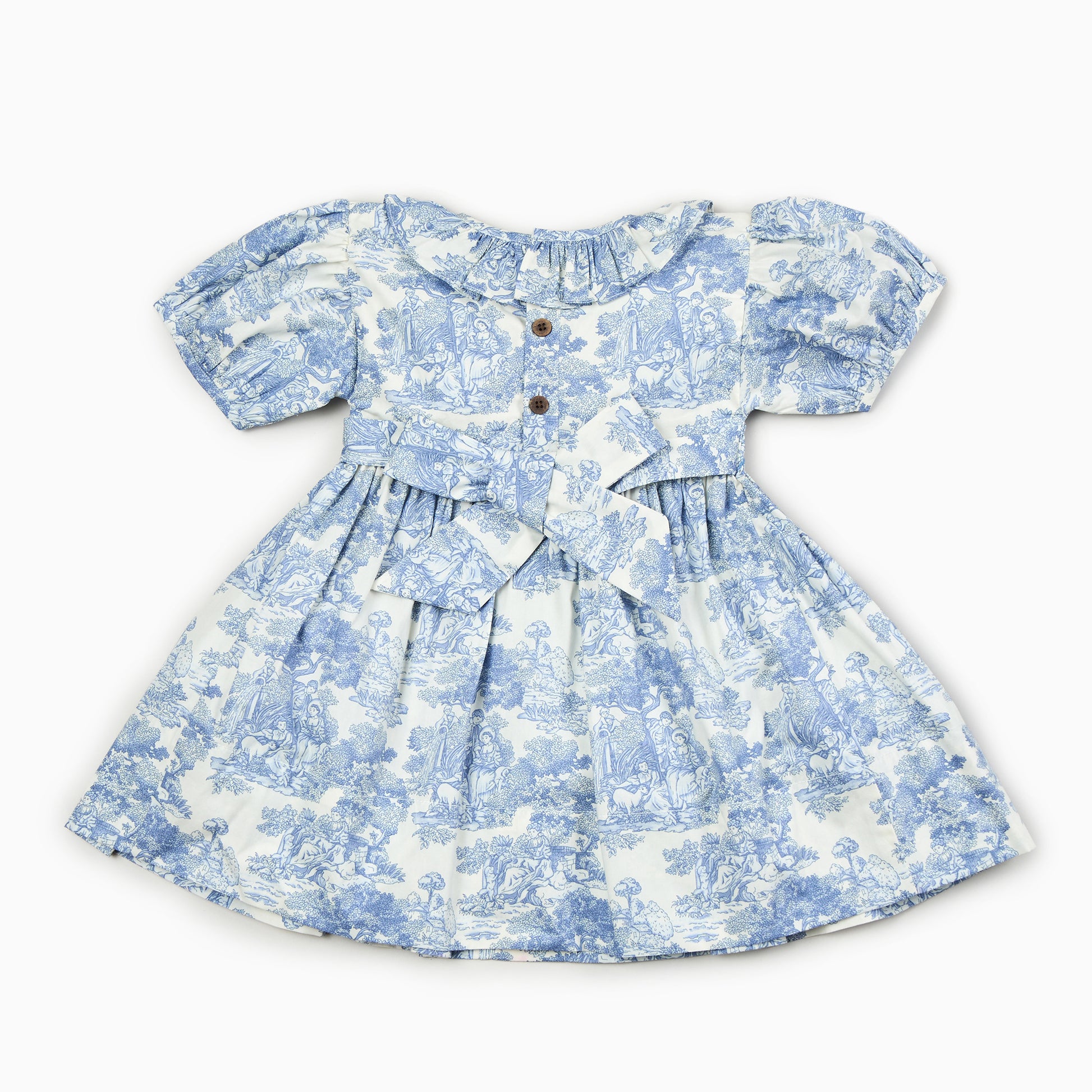 Hand Smocked Toile de Jouy Dress for Girls in Blue | Cotton Candy Lifestyle COTTON CANDY LIFESTYLE Hand Smocked Toile de Jouy Dress for Girls in Blue | Cotton Candy Lifestyle COTTON CANDY LIFESTYLE