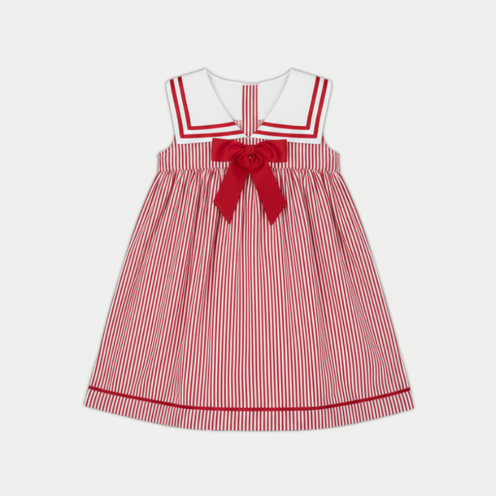 Red and white striped dress with a large bow on a light gray background