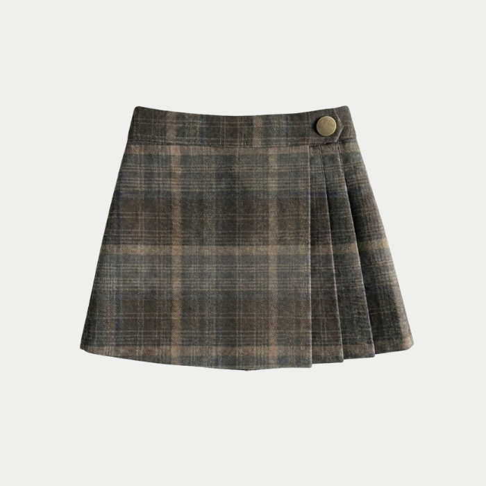 A plaid pleated skirt in dark brown and gray tones with a single gold button closure at the waist, shown against a light gray background.