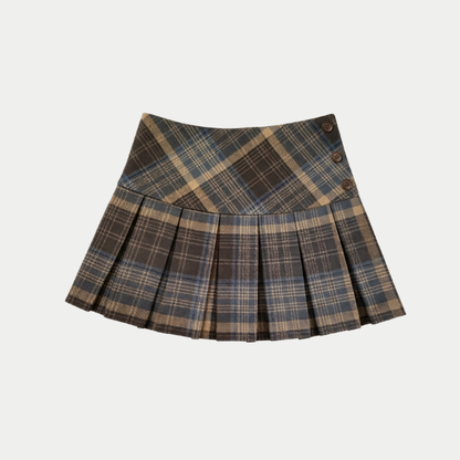 A pleated skirt in a brown, beige, and blue plaid pattern, featuring a high waistband with three decorative buttons on the right side, shown against a light grey background.