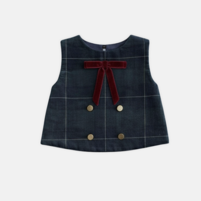 corduroy vest with a red bow and gold buttons on a white background