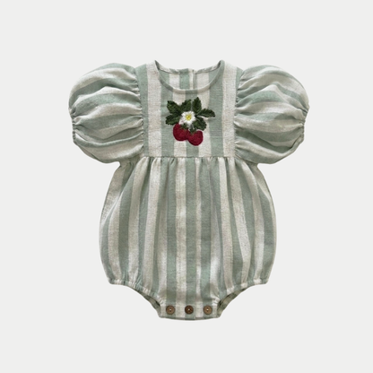 Striped sage romper with puff sleeves and strawberry embroidery design on a light gray background