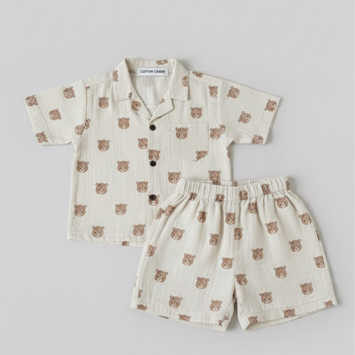 Children's co-ord set with teddy bear pattern on a light gray background
