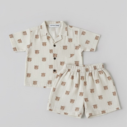 Children's co-ord set with teddy bear pattern on a light gray background
