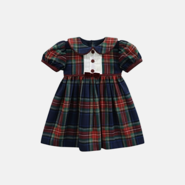 Plaid dress with a white pin tuck yoke on a white background