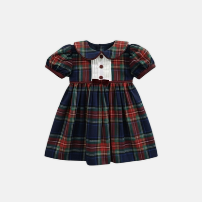 Plaid dress with a white pin tuck yoke on a white background