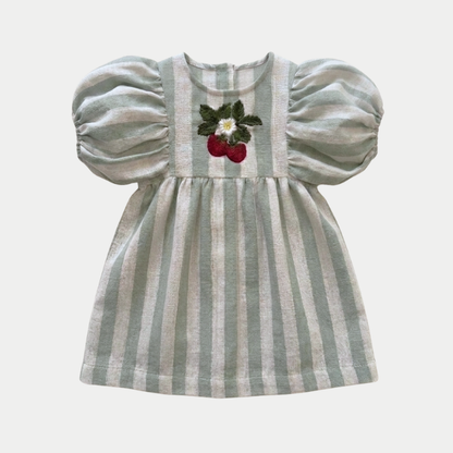 Striped sage dress with puff sleeves and strawberry embroidery design on a light gray background