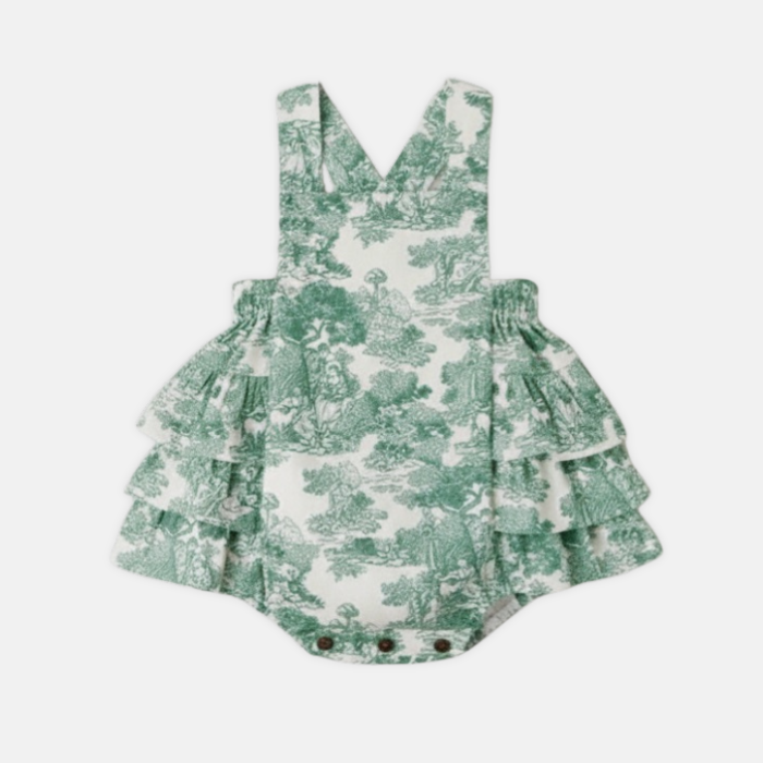 Green toile romper on a white background
